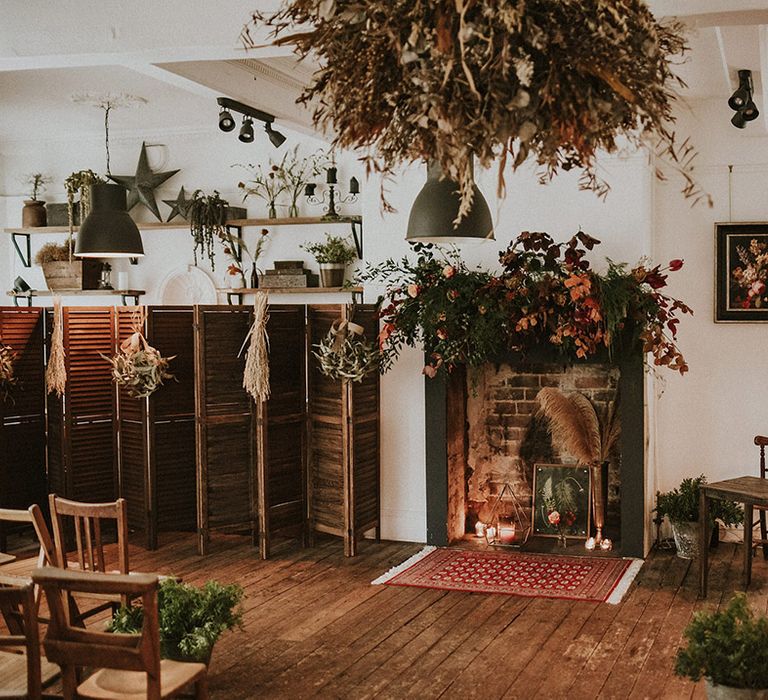 The Workshop & Loft wedding venue in Yorkshire with rustic vibes and autumnal flower decorations 