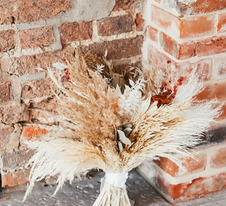 Dried wedding flower bouquet made from pampas grass and dried flowers 