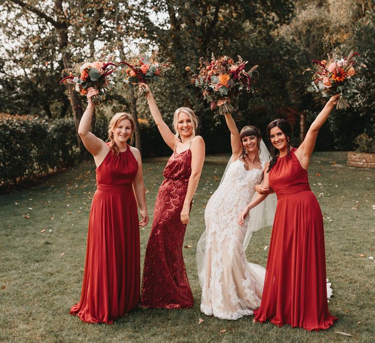 Bridesmaids in burgundy dresses at Millbridge Court wedding