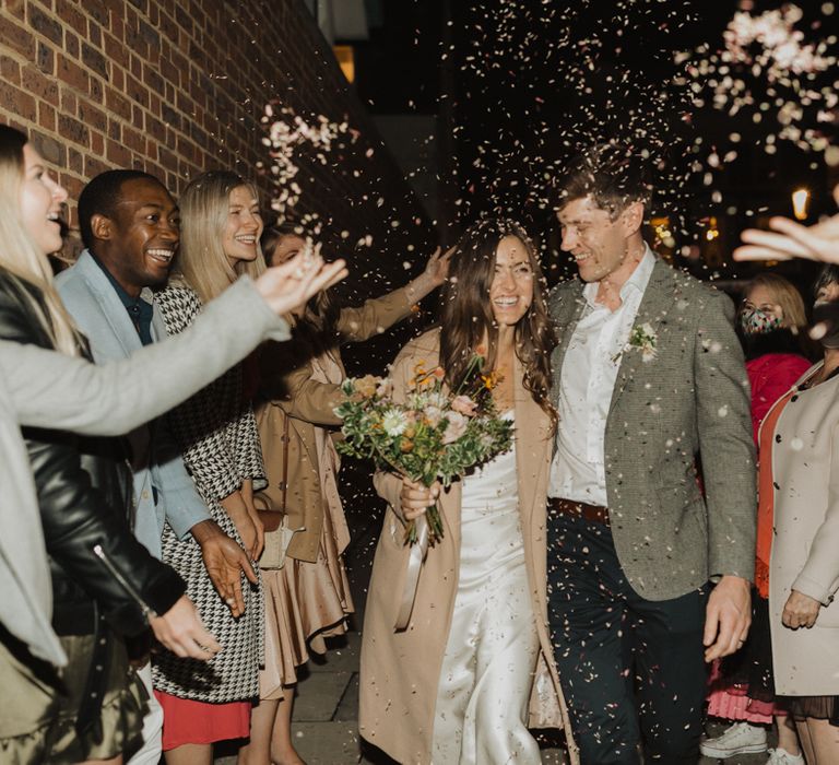 Confetti moment at pub wedding reception 