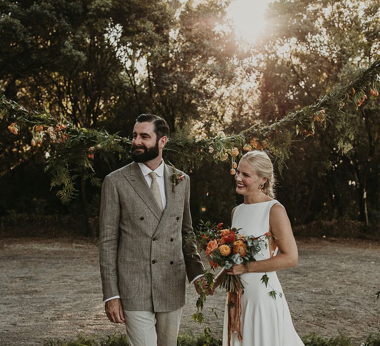 Bride and groom at the altar of outdoor Andalusia wedding