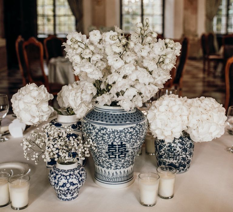 blue and white chinese pottery filled with white flowers for classic wedding in Austria 