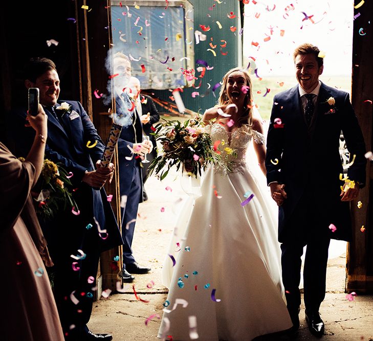 Barn wedding confetti moment