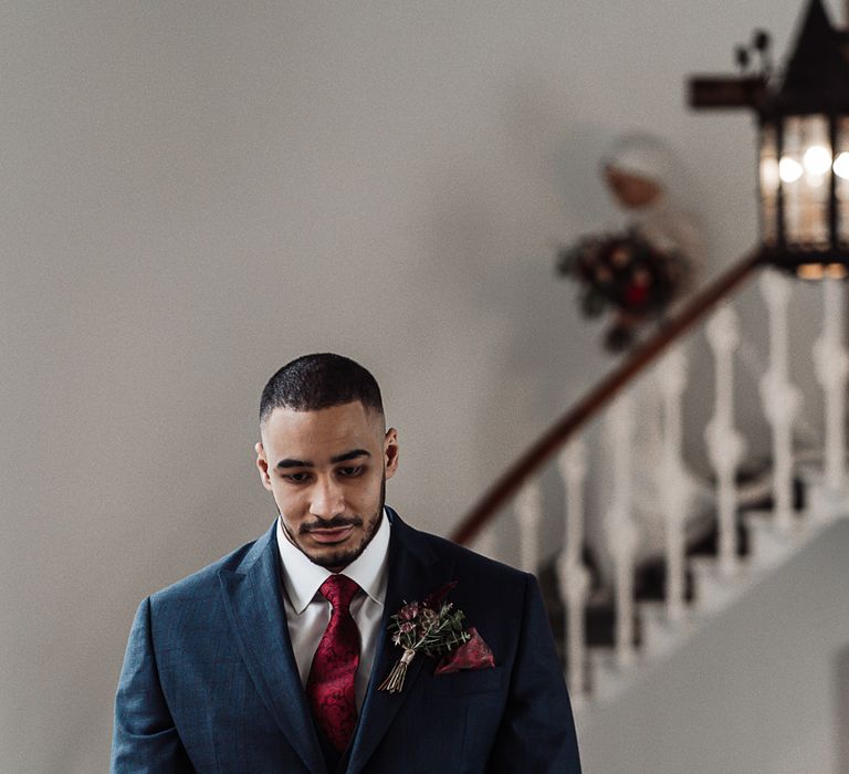 Groom waiting for his bride at First Look 