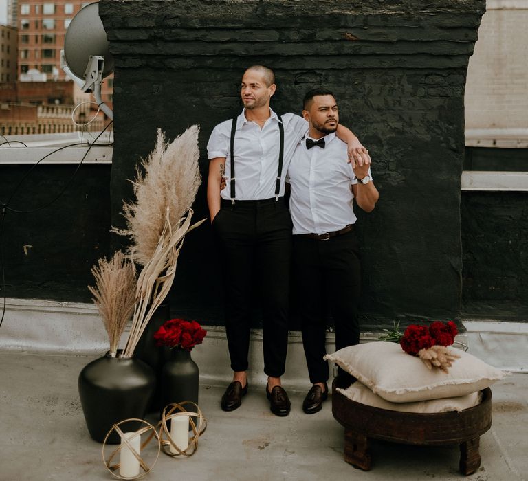 Grooms at gay wedding New York with pampas grass decor