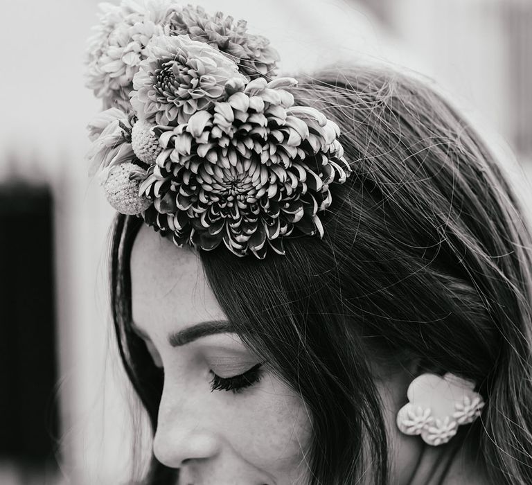 Black and white portrait of a bride with a Frida Kahlo inspired flower crown 