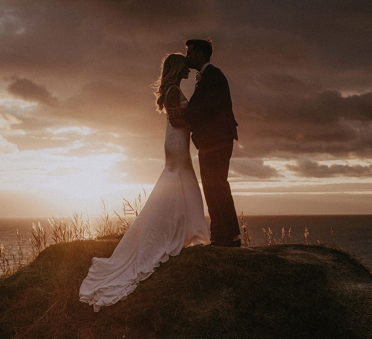 Golden hour wedding portrait by Isle of Wight wedding photographer