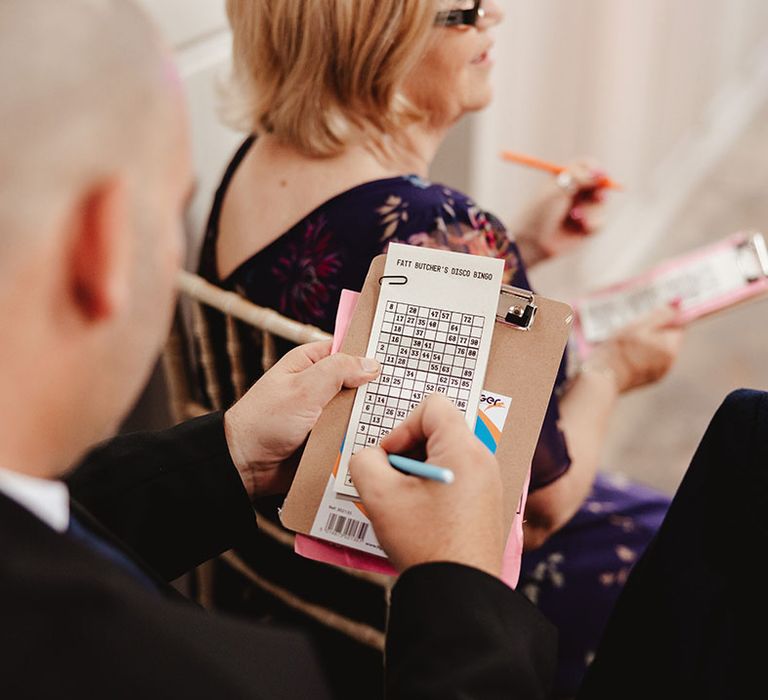 Drag entertainment bingo cards for wedding guests to participate in