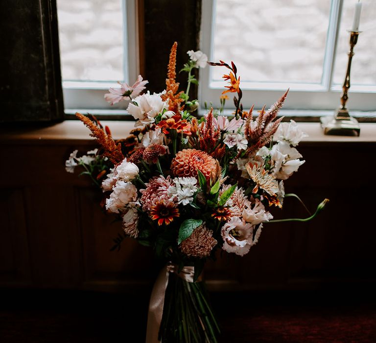 Colourful floral bouquet for boho styled wedding day