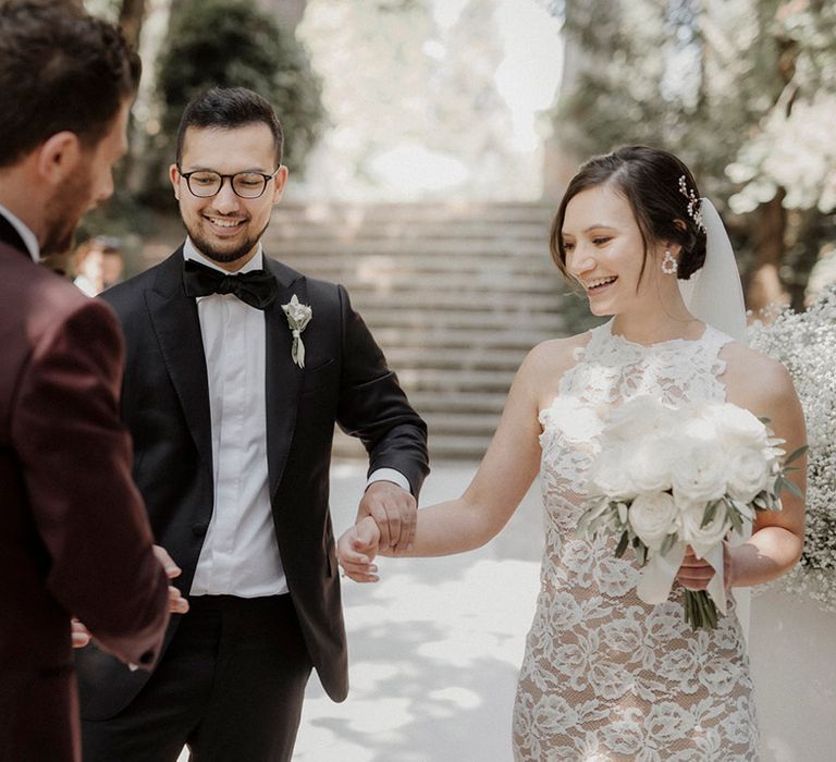 Outdoor wedding ceremony at Badia di San Vittore in Italy