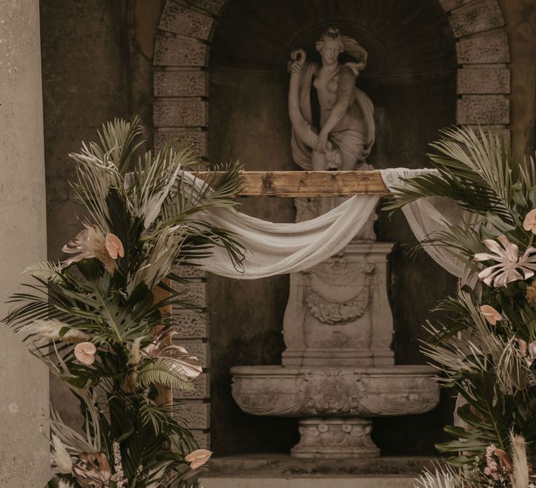 Altar at Wotton House with tropical wedding flower arrangements