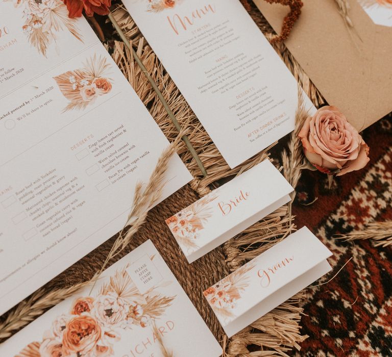 Stationery with floral theme in oranges 