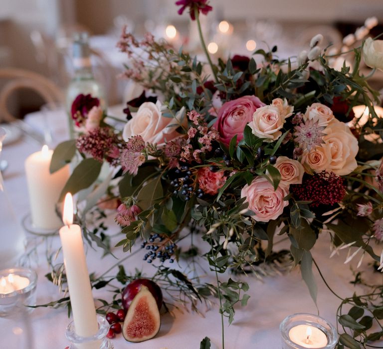 Red, peach, pink and berry wedding flower bouquet