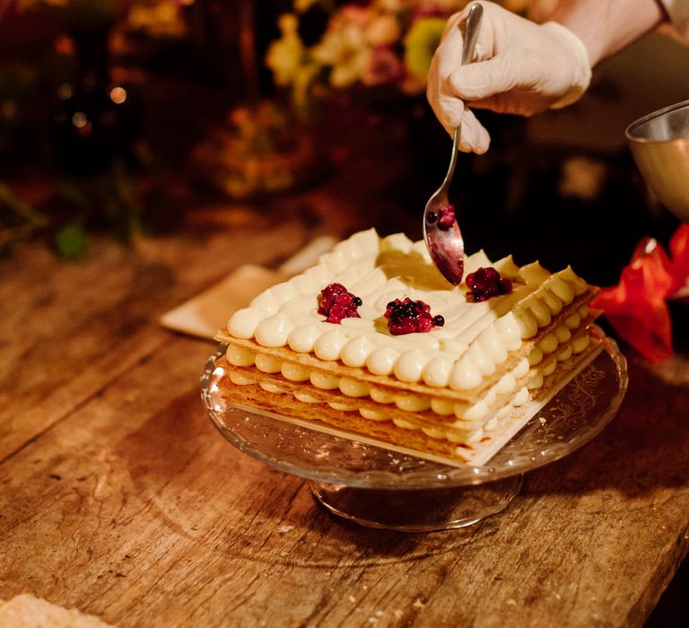 An Italian dessert wedding cake of meringue and thin pastry being freshly made