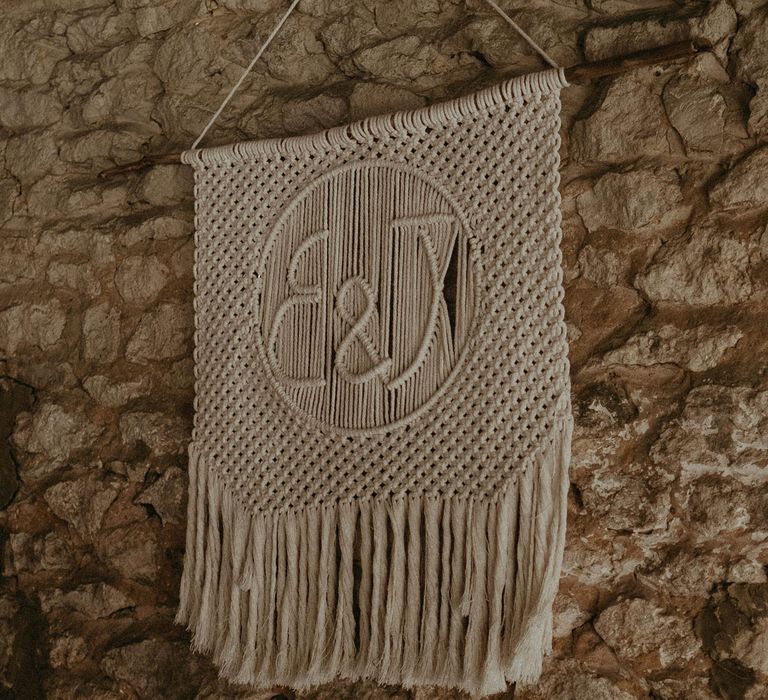 Macrame wedding wall hanging with E&J initials for Isle of Wight wedding