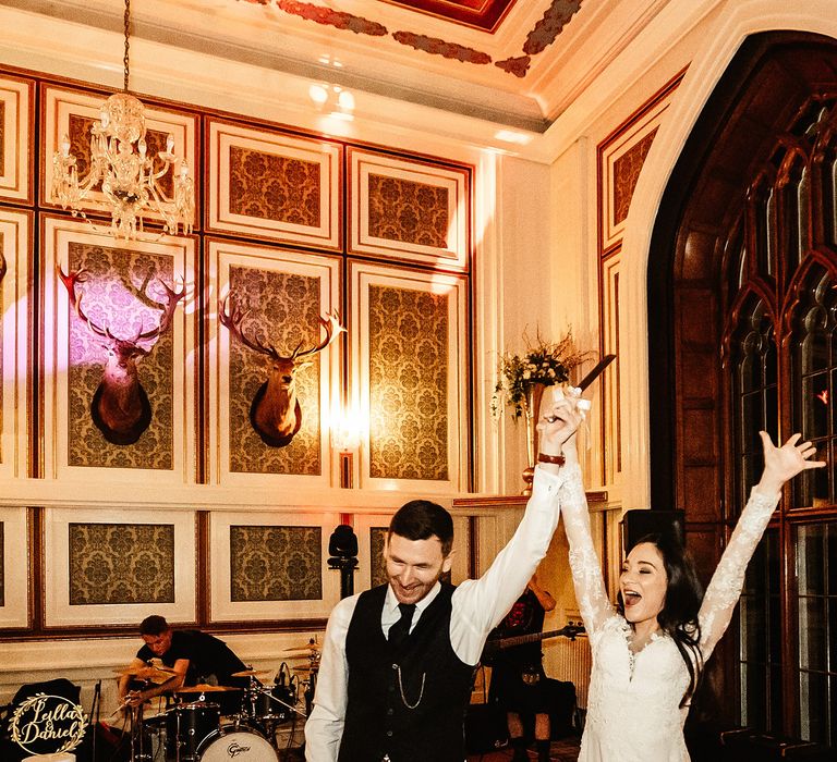 Bride & groom celebrate during first dance at the Drumtochy Castle wedding reception