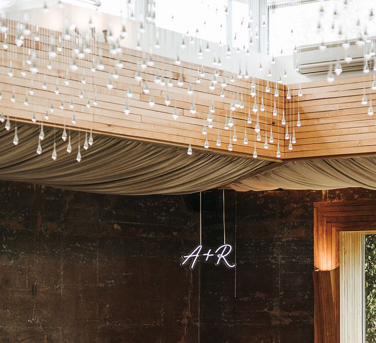 White personalised neon sign in the reception room 