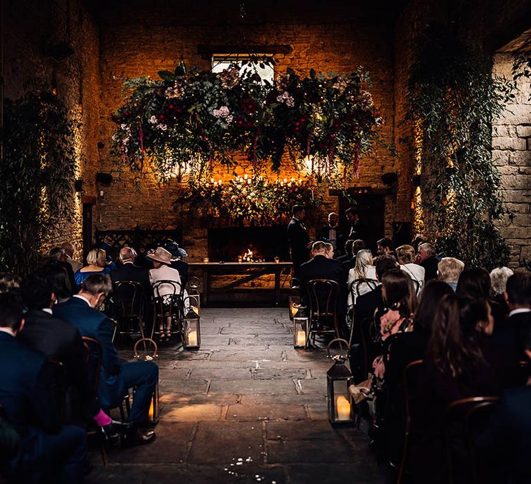 Cripps Barn wedding venue with a rustic theme and guests waiting for the wedding 