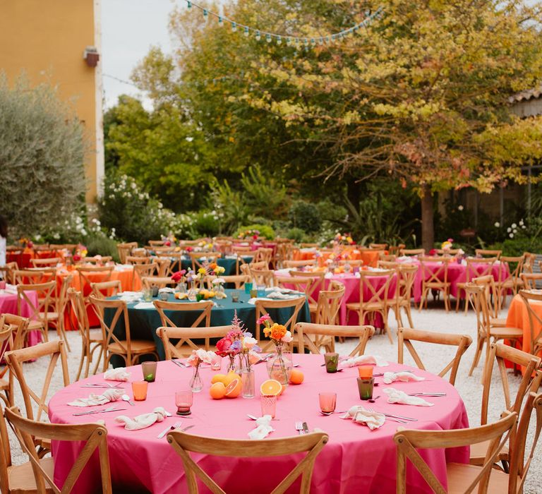 Outdoor destination wedding at Domaine de Blanche Fleur with fruit centrepiece decor