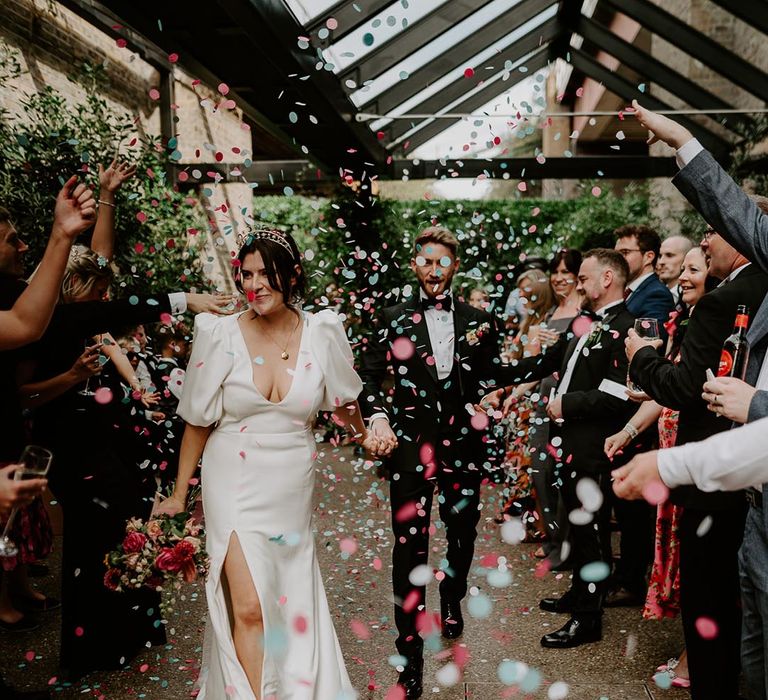 Pastel wedding confetti exit at 100 Barrington wedding venue in London