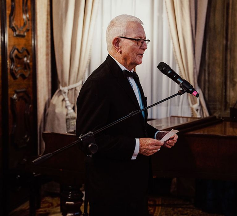 Wedding speech read out by father of the groom at the luxe ornate hotel wedding in Venice 