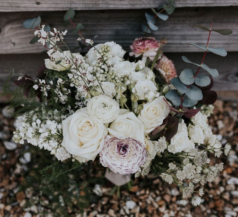 White rose, ranunculus and fern wedding bouquet for Caswell House wedding