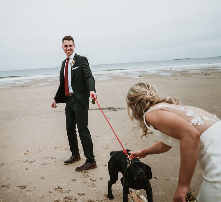 Bride & groom see one another for the first time on the beach