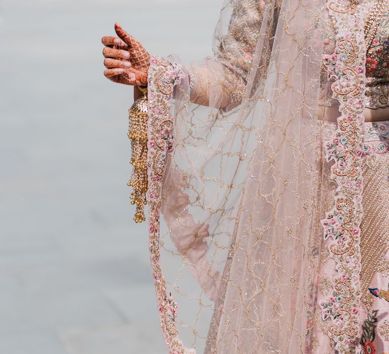 Beautifully embroidered bespoke lehengha complete in pastel pink shade