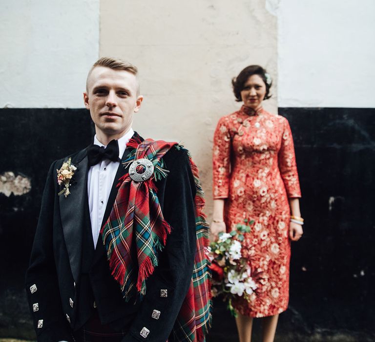 Groom in traditional kilt wedding outfit for town hall wedding