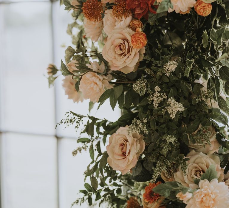 Orange, peach and white rose flowers for vertical arrangement 