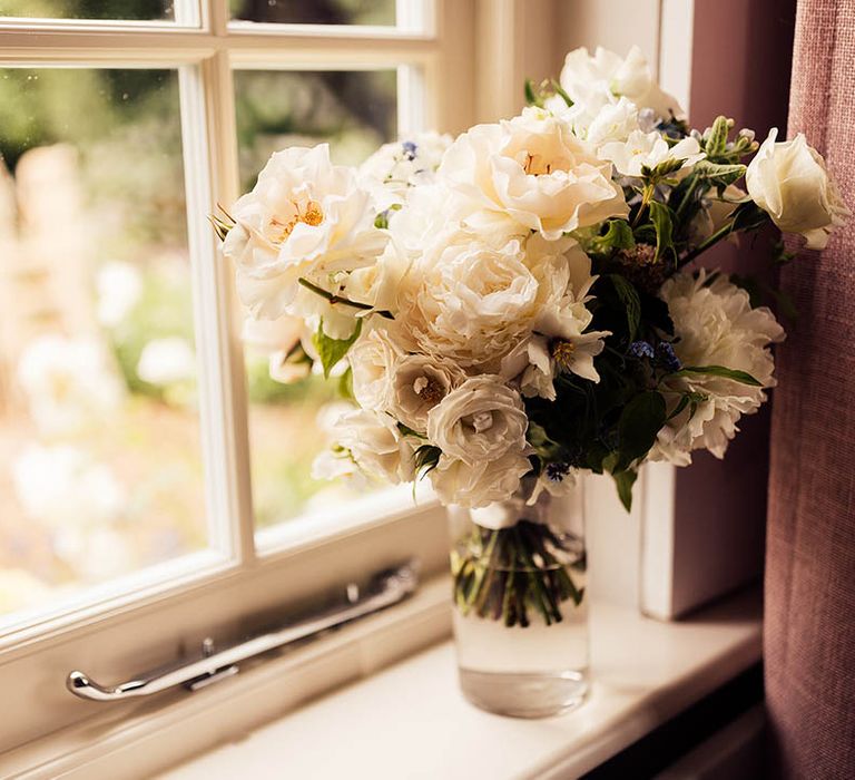 Classic and traditional white wedding bouquet 