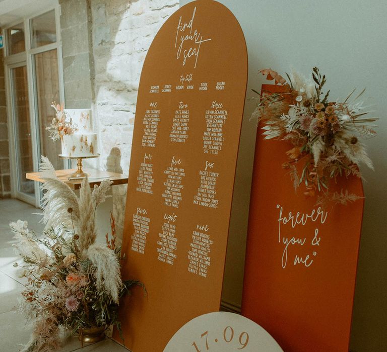 Orange and red wedding seating chart wedding sign for boho autumnal wedding 