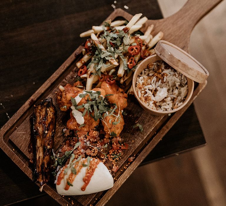 Sharing platter of street food with vegetarian options for guests