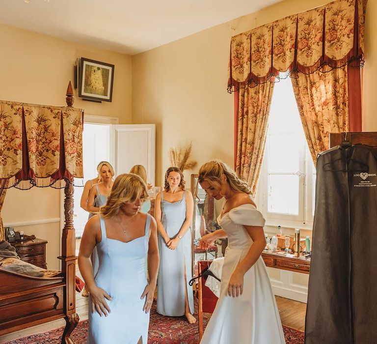 Bridesmaids and bride getting ready for the wedding in France 