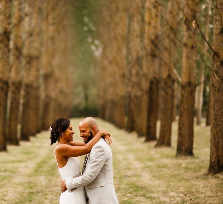 Pale wedding suit for groom at destination wedding