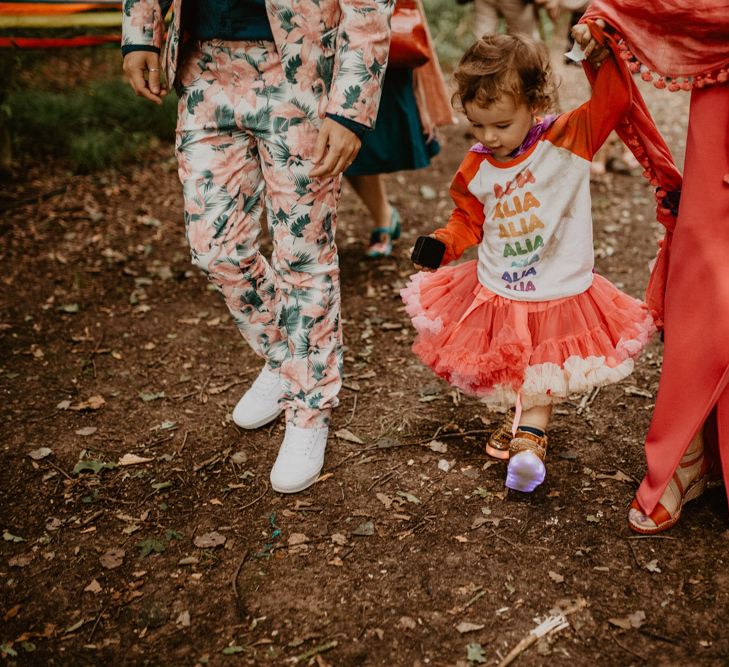 flower girl in slogan t-shirt and tutu for rainbow wedding