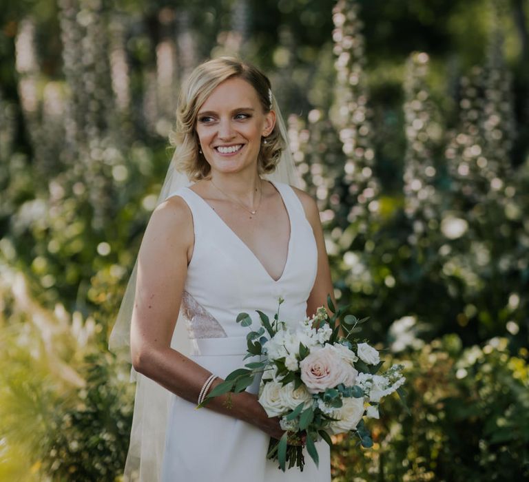 Bride in White by Vera Wang wedding dress