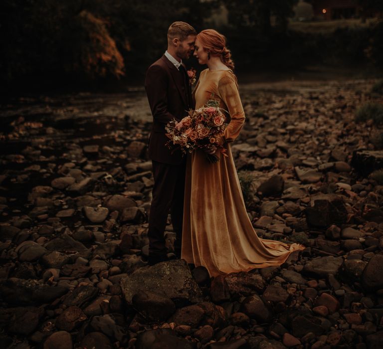 Bride in a velvet wedding dress with bridal braid