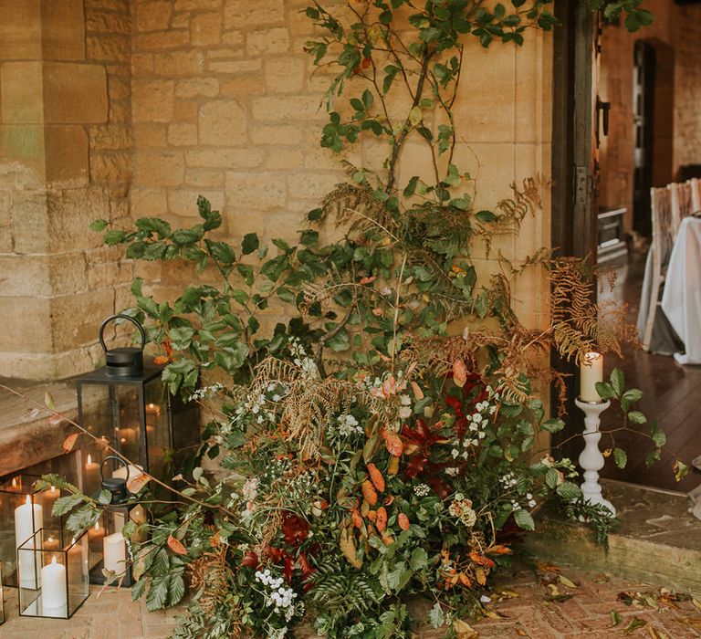 Autumn wedding flower arrangement with lanterns 