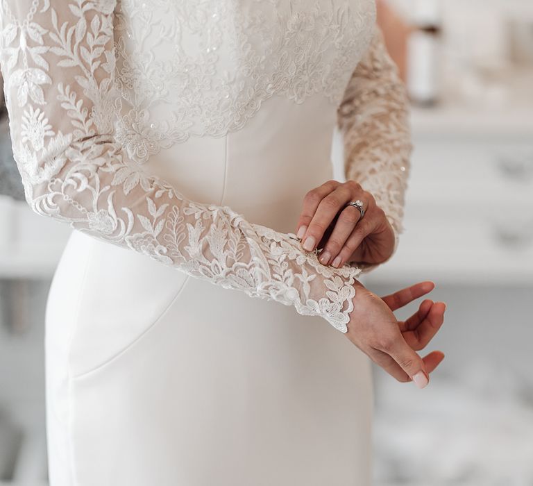 Beige wedding nails and long lace sleeves