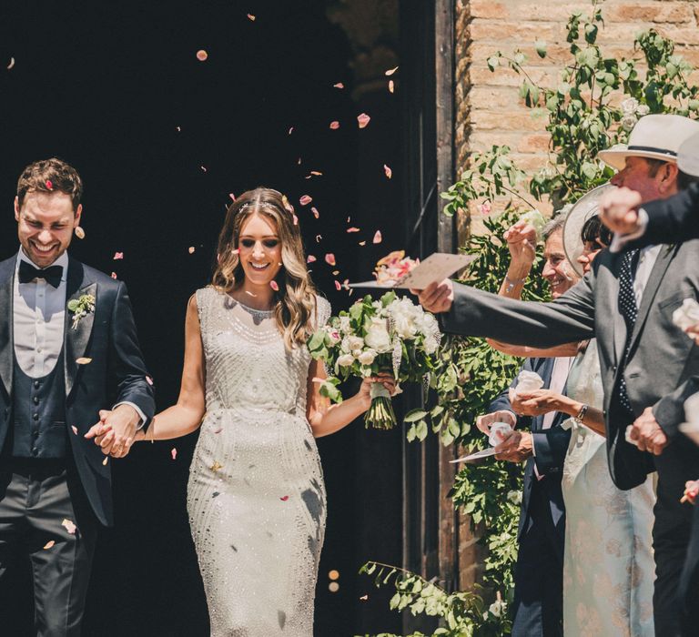 Italy wedding confetti moment for bride and groom