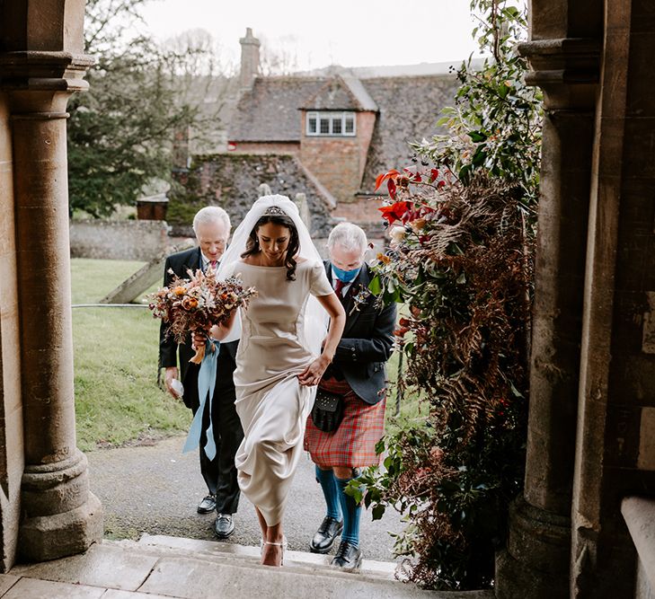 Bride enters the church for her wedding ceremony.