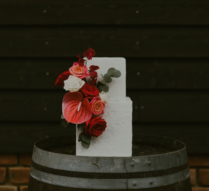 Contemporary square cake complete with floral decor