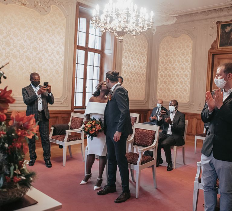 Bride & groom during civil ceremony indoors