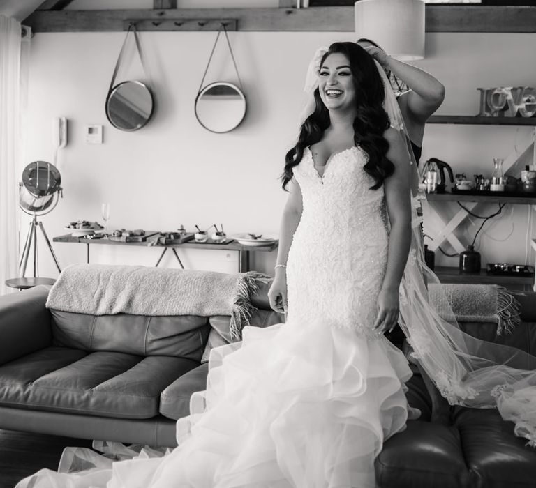 Wedding morning getting ready portrait with bride in a Mori Lee fishtail wedding dress