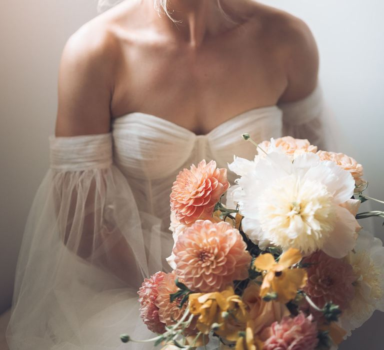 Bride in a strapless Calla Blanche wedding dress