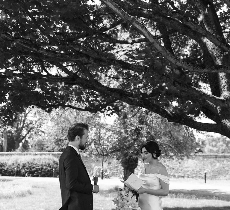 Black and white wedding couple photo after their first look moment 