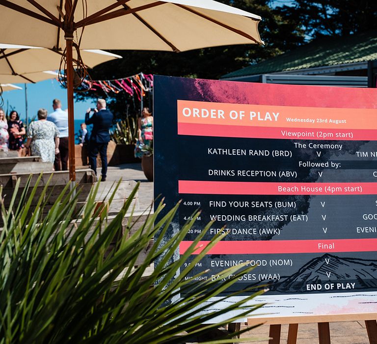 Order of the day wedding sign styled like a tennis announcement 