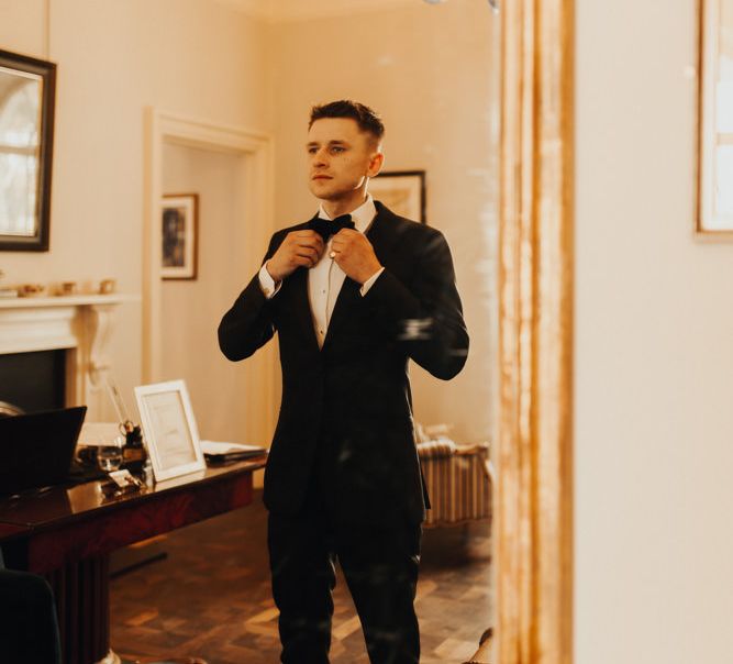 Groom getting ready for wedding day wearing Tom Ford Bow Tie - Mr Porter