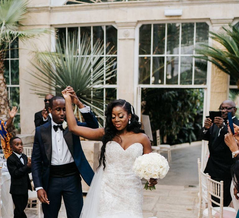 Bride and groom dancing into their reception at Syon Park 